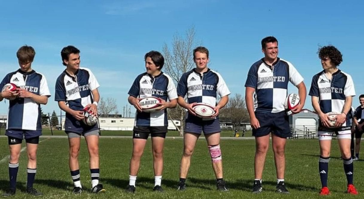 Equipo de rugby americano en el campo
